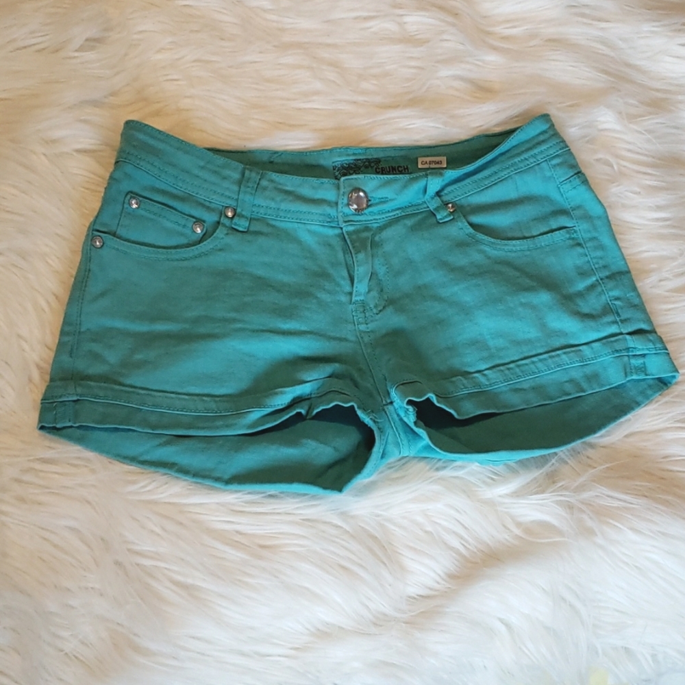 Bright teal jean shorts